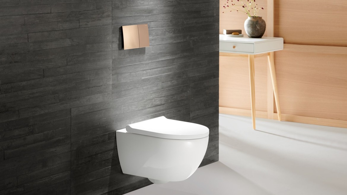 Geberit Acanto WC with Geberit Sigma70 flush plate in rose gold Geberit Acanto WC with Geberit Sigma70 flush plate in rose gold