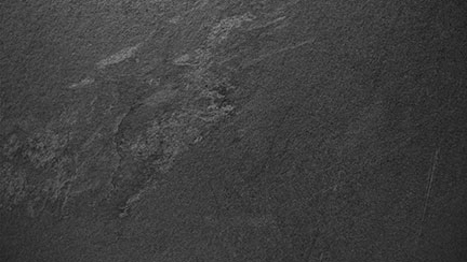 Monolith front cladding in stoneware slate