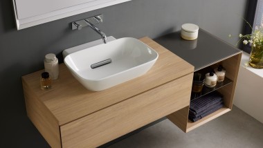 Bathroom with furniture made of wood from the Geberit Acanto series