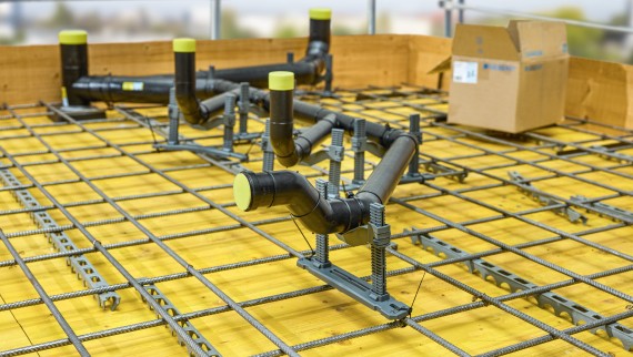 Geberit PE branch discharge pipe embedded in concrete Geberit PE branch discharge pipe embedded in concrete