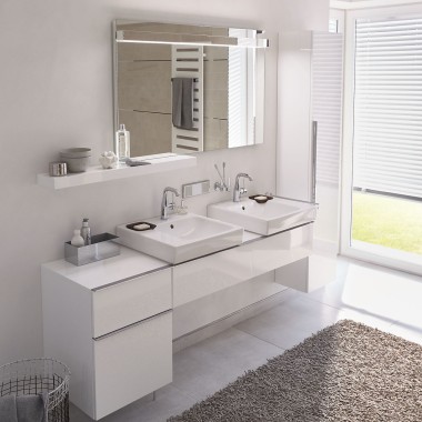 A bath rug can add a splash of colour to a light bathroom 