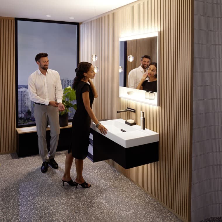 Man and woman in bathroom from the Geberit ONE bathroom series Man and woman in bathroom from the Geberit ONE bathroom series