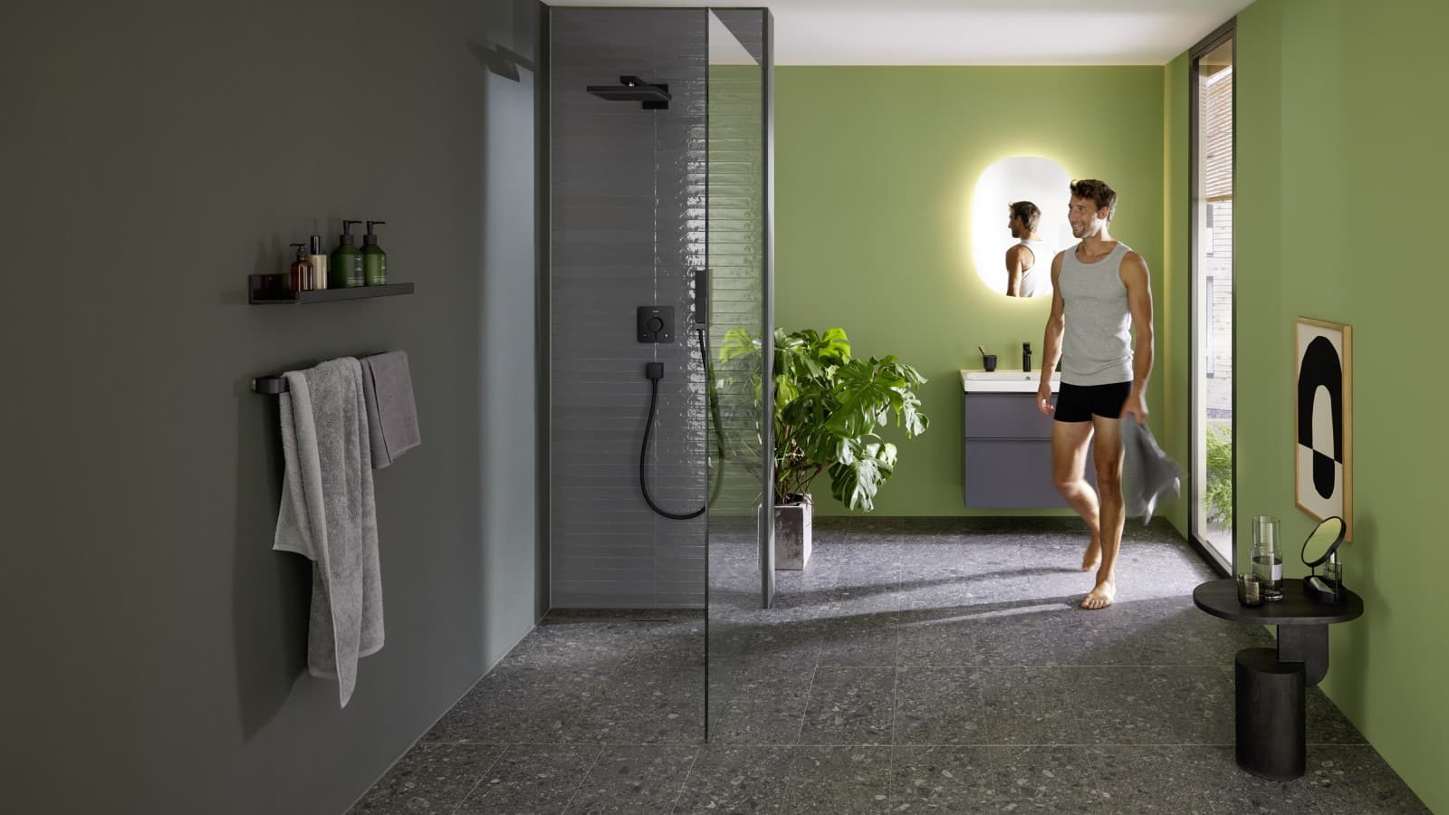 Man in bathroom with Geberit CleanLine30 Man in bathroom with Geberit CleanLine30