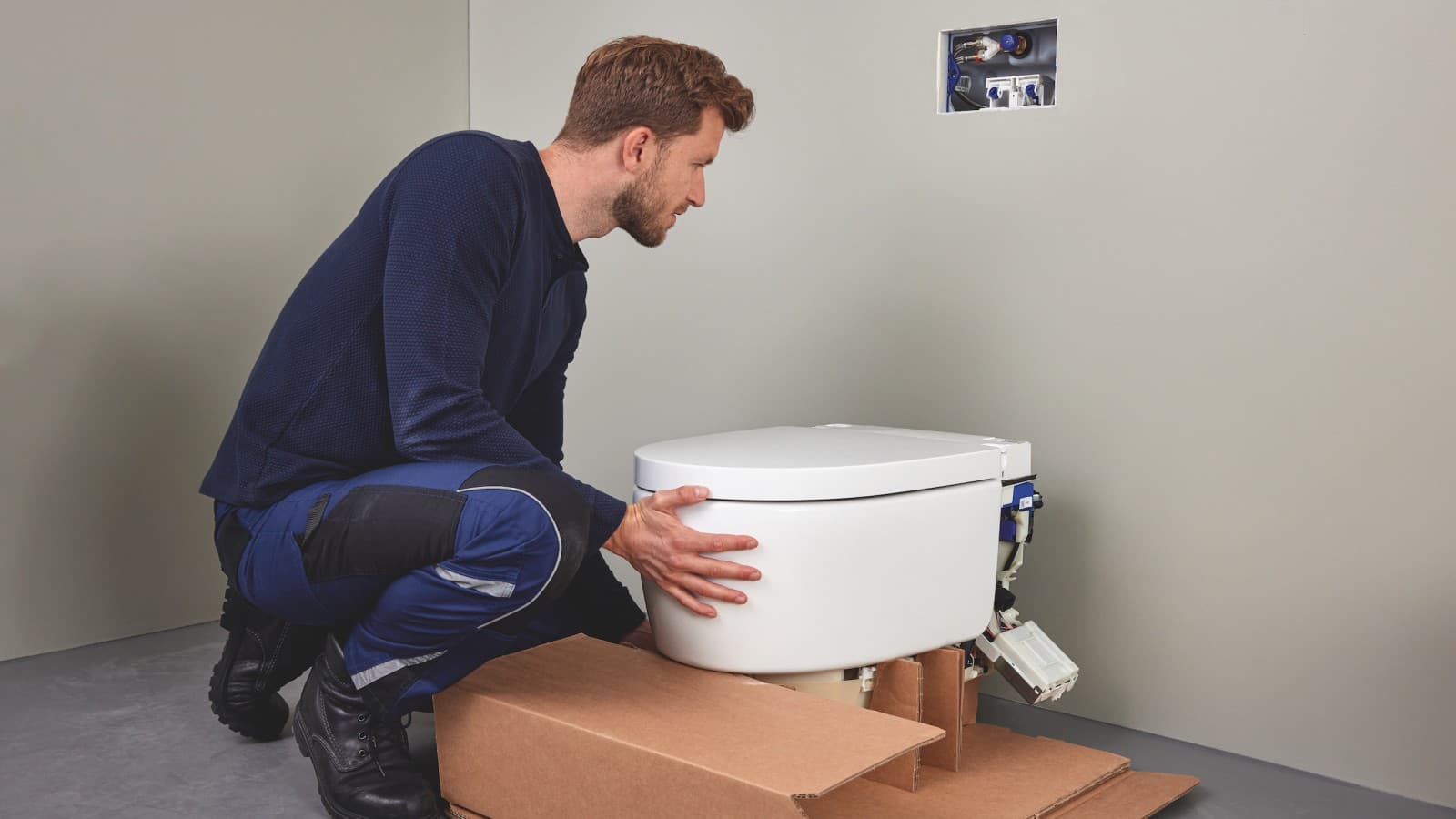 Sanitary professional installs a Geberit AquaClean Sela shower toilet Sanitary professional installs a Geberit AquaClean Sela shower toilet